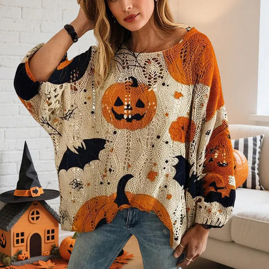 Person wearing a Halloween-themed sweater with pumpkins and bats in a cozy living room.